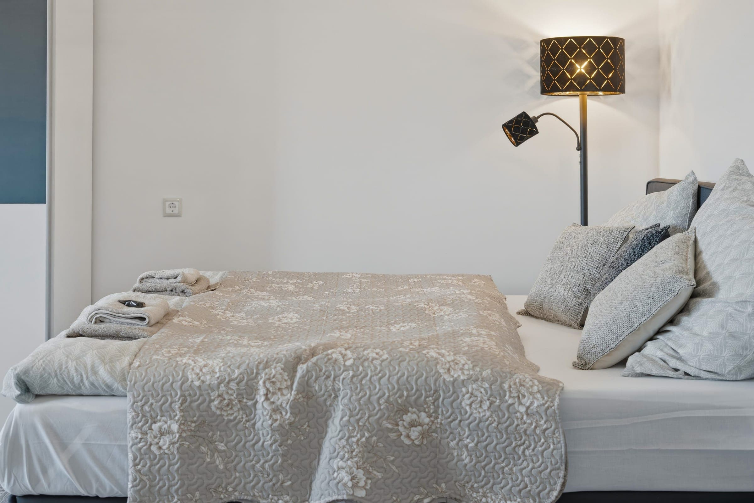 Bedroom with reading lamp