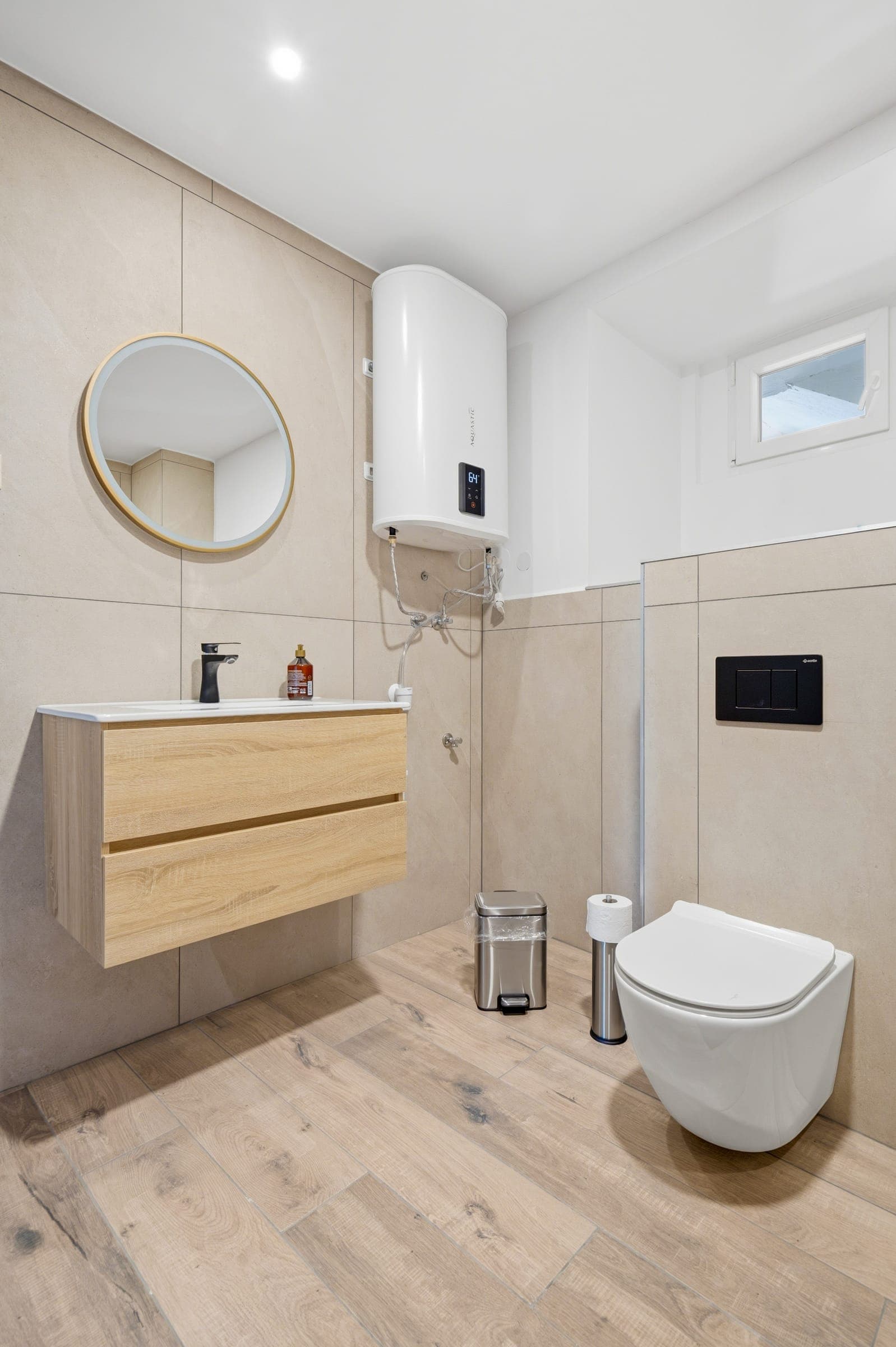 Bathroom with vanity and mirror